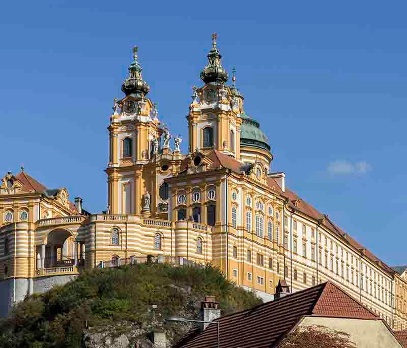 Melk Abbey, perched above the Danube, is renowned for its splendid baroque architecture and historical importance.