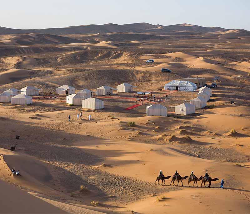 Merzouga - Dune Bashing and Stargazing: Renowned for its towering dunes and as a gateway for Sahara desert adventures.
