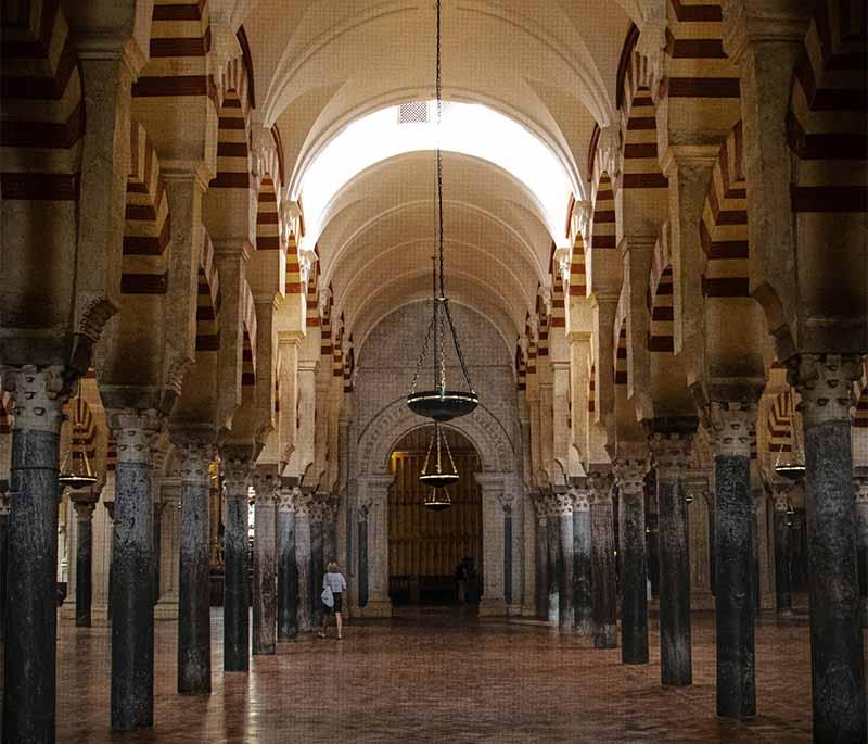 Mezquita-Catedral (Cordoba) - A unique mosque-cathedral known for its stunning architecture, columns, and arches.