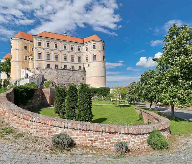 Mikulov Castle, a beautiful chateau set on a hill overlooking the town of Mikulov, known for its wine production and history.