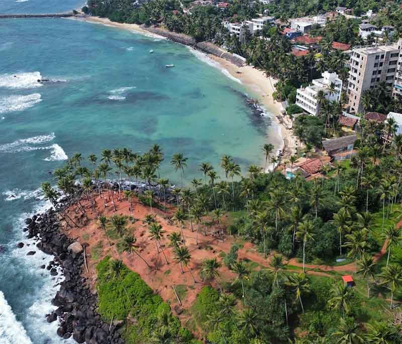 Mirissa Beach - A popular beach destination known for its beautiful sandy shores, surfing, and whale watching.