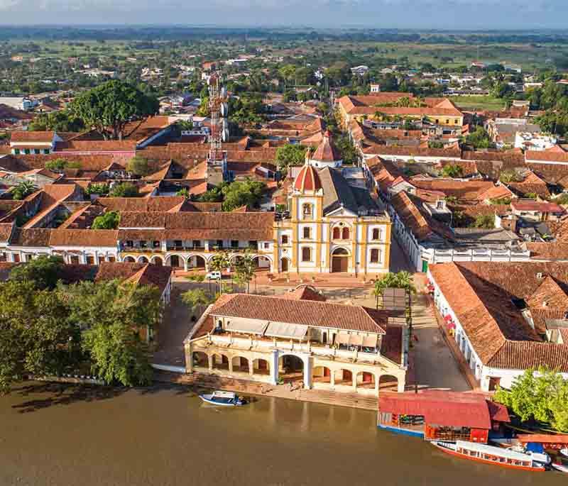 Mompox, a UNESCO World Heritage Site with preserved colonial architecture and a rich cultural heritage along Magdalena River.