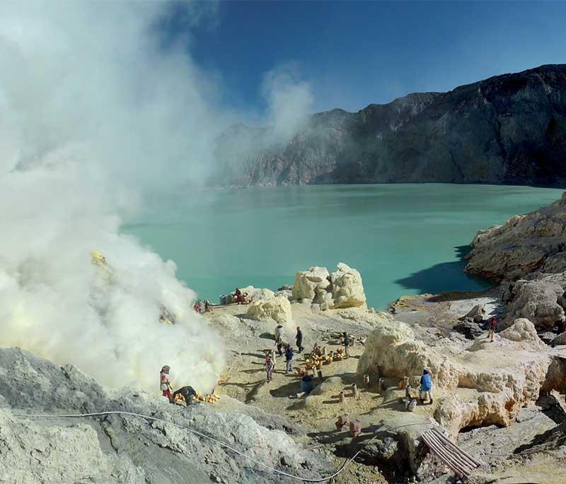 Mount Ijen, East Java, an active volcano known for its striking blue fire phenomenon and sulfur mining.