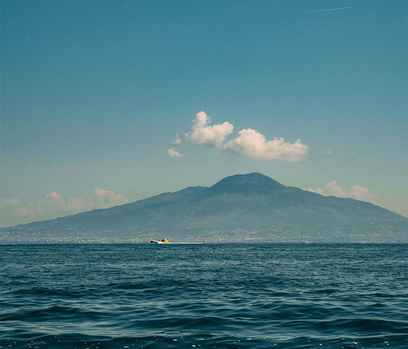 Mount Vesuvius, Naples, an active volcano famous for the eruption that buried Pompeii, offering hiking trails and views.