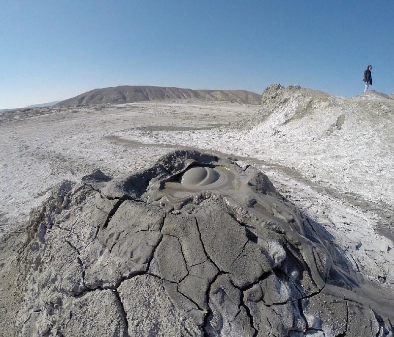 Muddy Volcanoes - A natural phenomenon in Buzău County, featuring bubbling mud pools and unique landscapes.