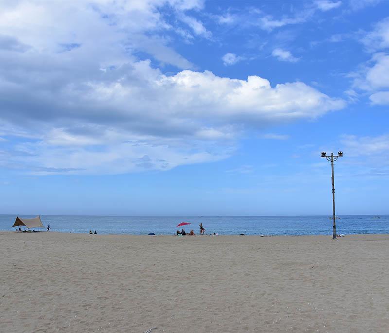 Naksan Beach, Yangyang - A beautiful beach on the east coast, known for its clear waters, soft sand, and scenic views.