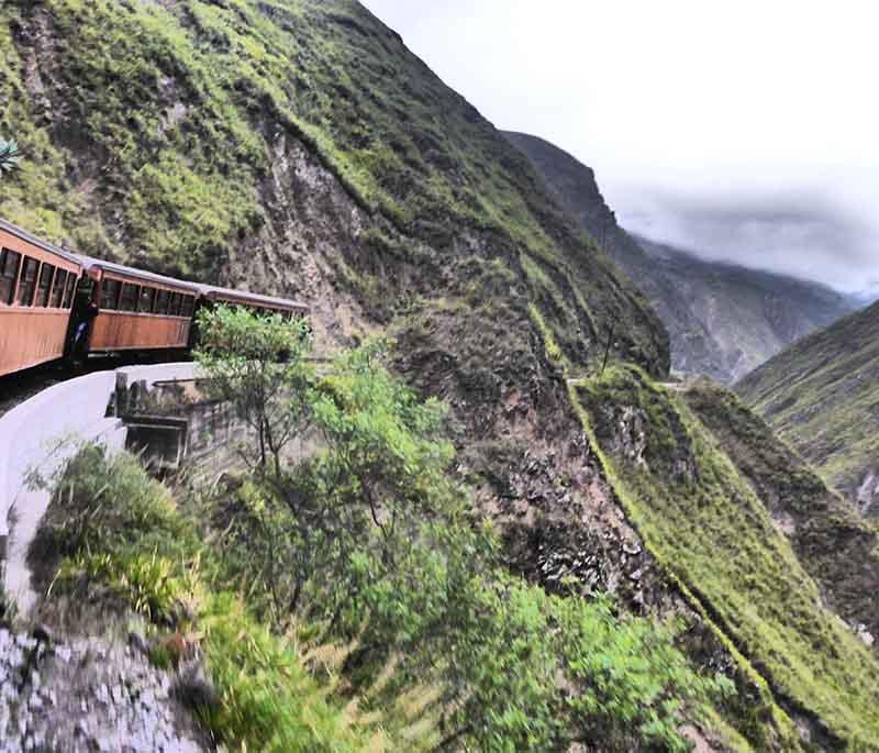 Nariz del Diablo Train Ride, a thrilling train journey through the Andes, known for its steep switchbacks and stunning views.