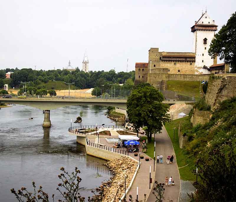 Narva River Promenade, a scenic riverside walk in Narva, offering beautiful views of Narva Castle and Ivangorod Fortress.