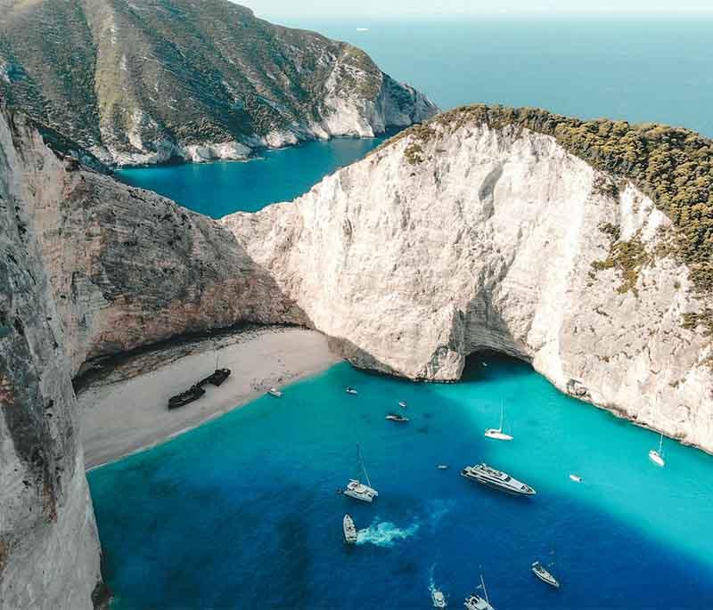 Navagio Beach (Shipwreck), a famous beach on Zakynthos, known for its clear blue waters and the wreck of a smuggler's ship.