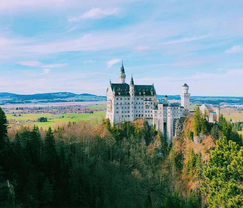 Neuschwanstein Castle, Bavaria, a fairy-tale castle built by King Ludwig II, known for its location and architecture.