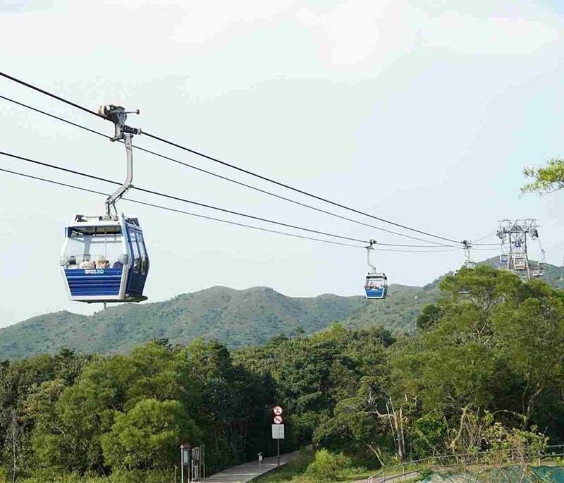 Ngong Ping 360, a scenic cable car ride offering breathtaking views of Lantau Island and surrounding landscapes.