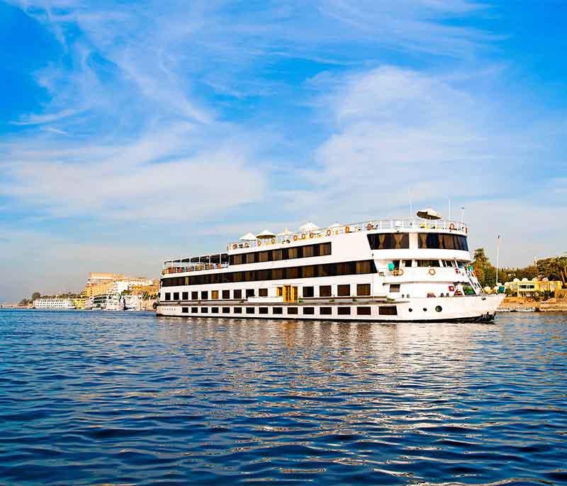 Nile River Cruises, offering scenic journeys along the Nile, visiting temples and tombs while experiencing Egypt's beauty.