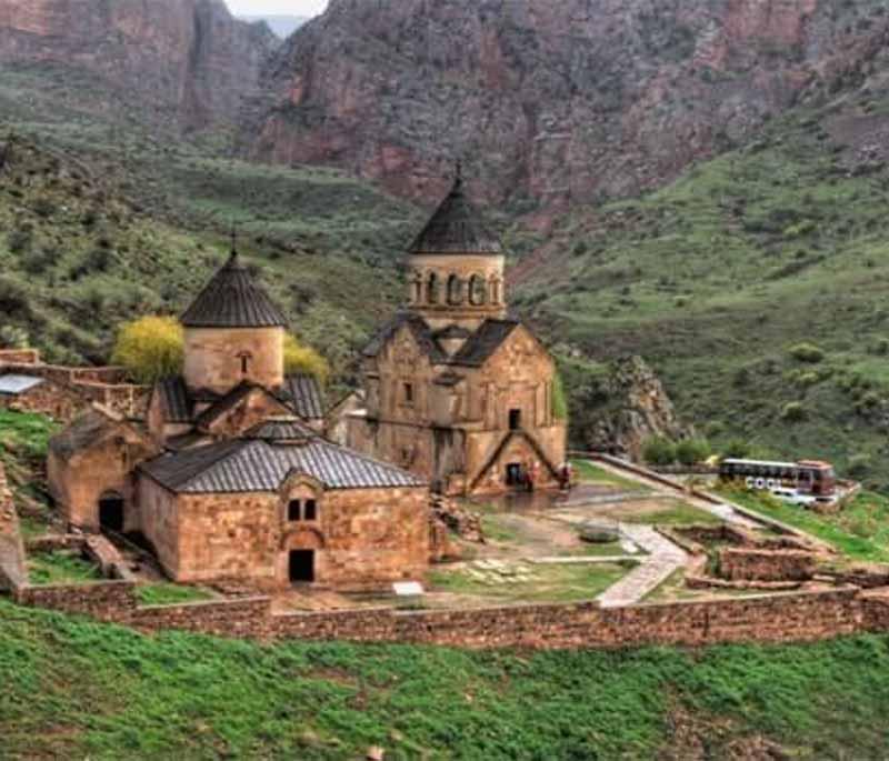 Noravank Monastery, showcasing a 13th-century Armenian monastery nestled in a narrow gorge with scenic beauty.