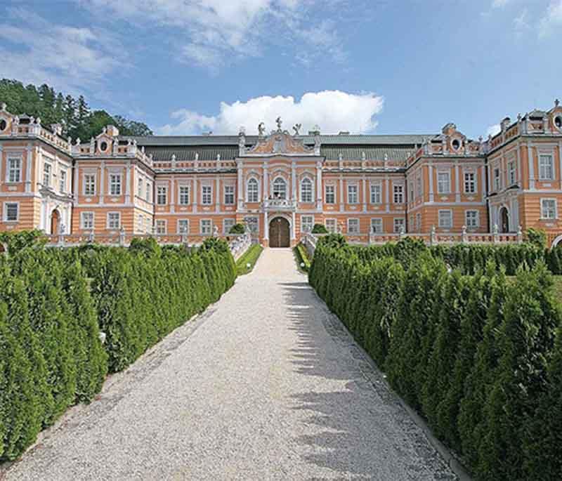 Nove Hrady Castle, a Rococo-style castle with beautifully preserved interiors, extensive gardens, and a fascinating history.