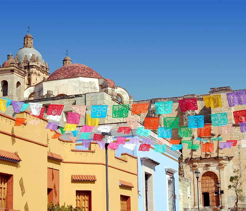 Oaxaca City, Oaxaca - Known for its indigenous cultures, colorful streets, artisan crafts, and exquisite culinary tradition.