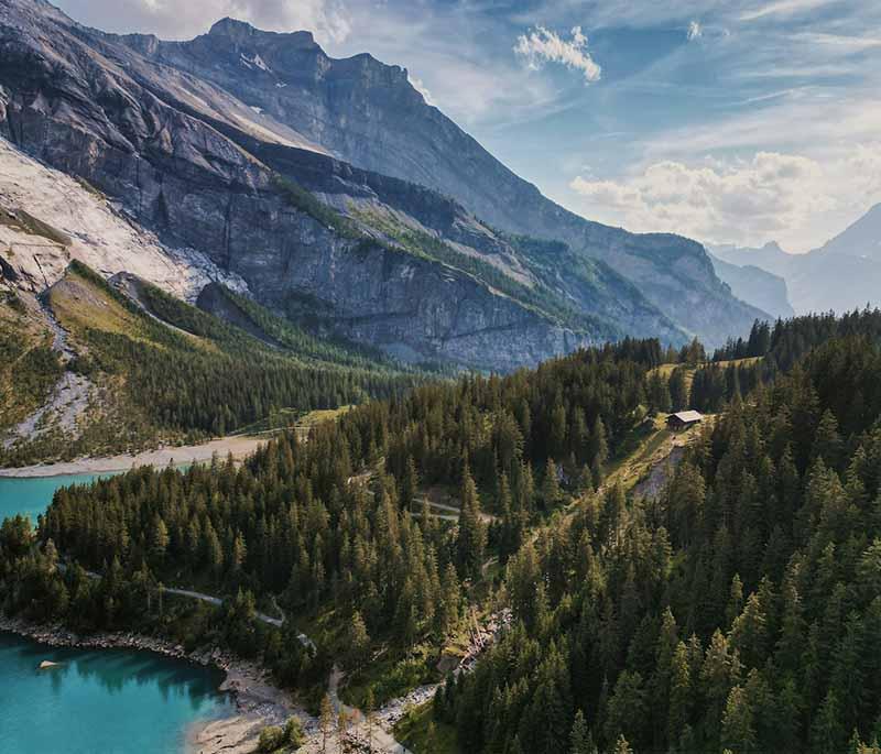 Oeschinen Lake - A stunning alpine lake near Kandersteg, popular for hiking, fishing, rowing, and scenic beauty.