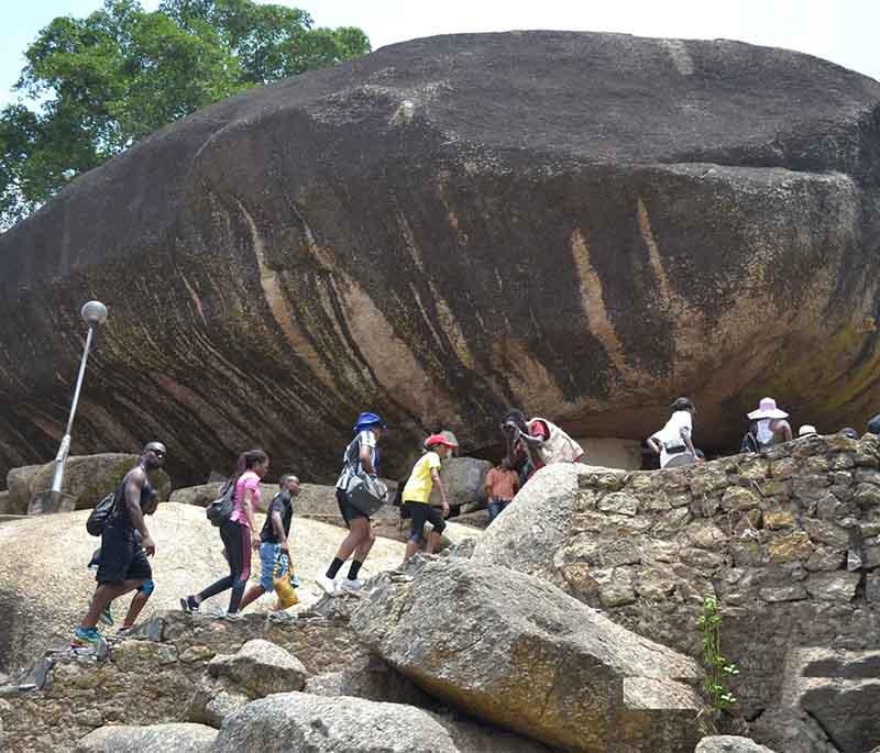 Olumo Rock - A historic rock formation in Abeokuta, offering caves, shrines, panoramic views, and cultural history.