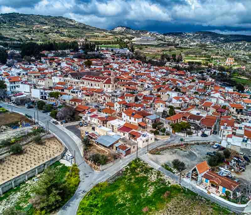 Omodos Village, a picturesque wine village known for its cobbled streets, historic monastery, and wine-tasting opportunities.