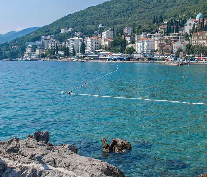 Opatija, a historic resort town known for its grand villas, picturesque parks, and long seaside promenade.