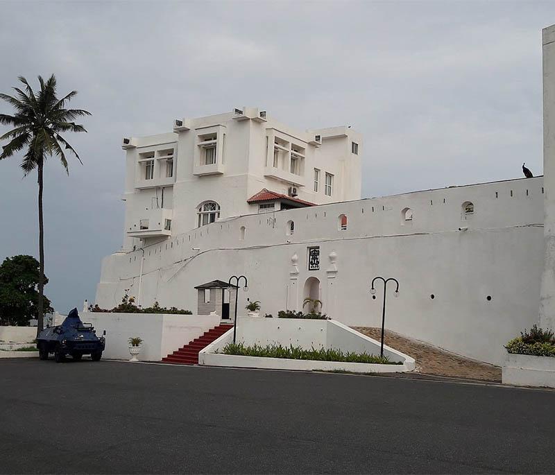 Osu Castle, also known as Fort Christiansborg, a historic castle located on the coast of Accra, with a complex history.