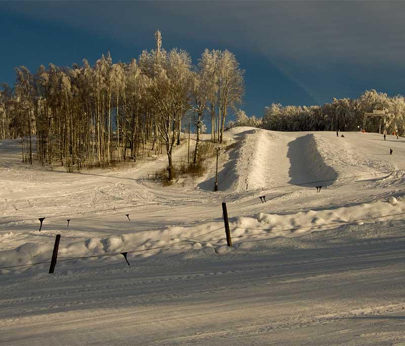 Otepaa, a scenic winter capital town in Estonia, known for ski resorts and beautiful natural surroundings.