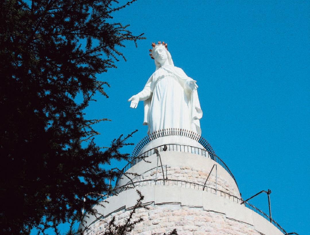 Our Lady of Lebanon Shrine, a large statue of the Virgin Mary overlooking the bay of Jounieh, a major pilgrimage site.