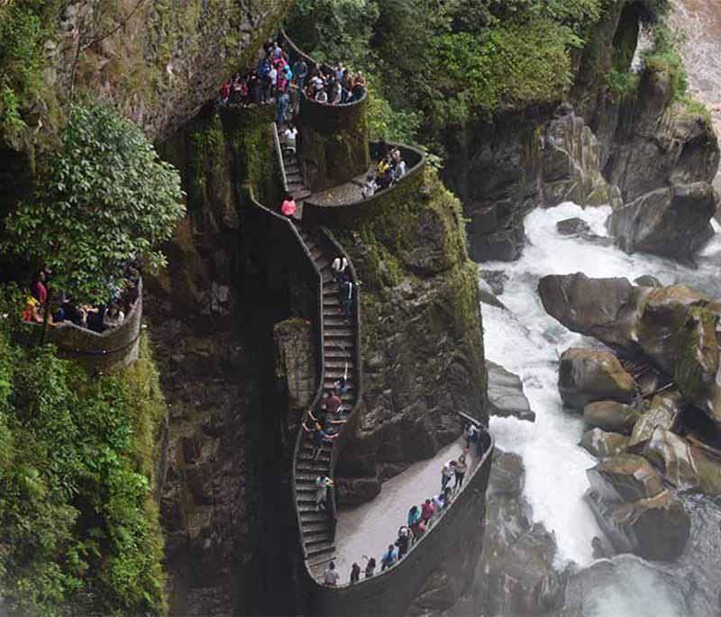 Pailon del Diablo Waterfall, a powerful and stunning waterfall located near Baños, accessible via a scenic hike.