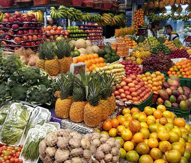 Paloquemao Market (Bogotá), a bustling market known for vibrant displays of fresh produce, flowers, and traditional foods.