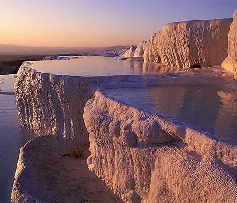 Pamukkale: Stunning white terraces and ancient Hierapolis, a UNESCO World Heritage site, offer a unique glimpse into history.