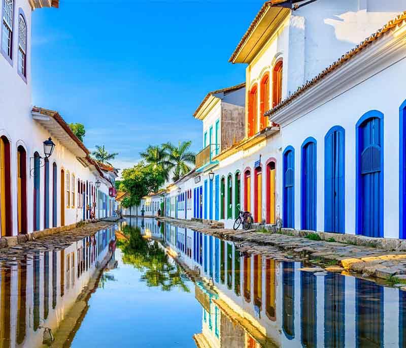 Paraty, featuring a charming colonial town with cobblestone streets, historic architecture, and beautiful coastal scenery.