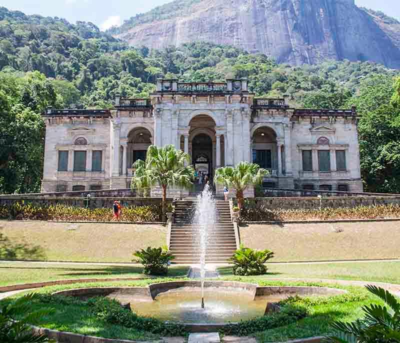 Parque Lage, Rio de Janeiro, highlighting a public park with beautiful gardens, historic buildings, and a scenic backdrop.