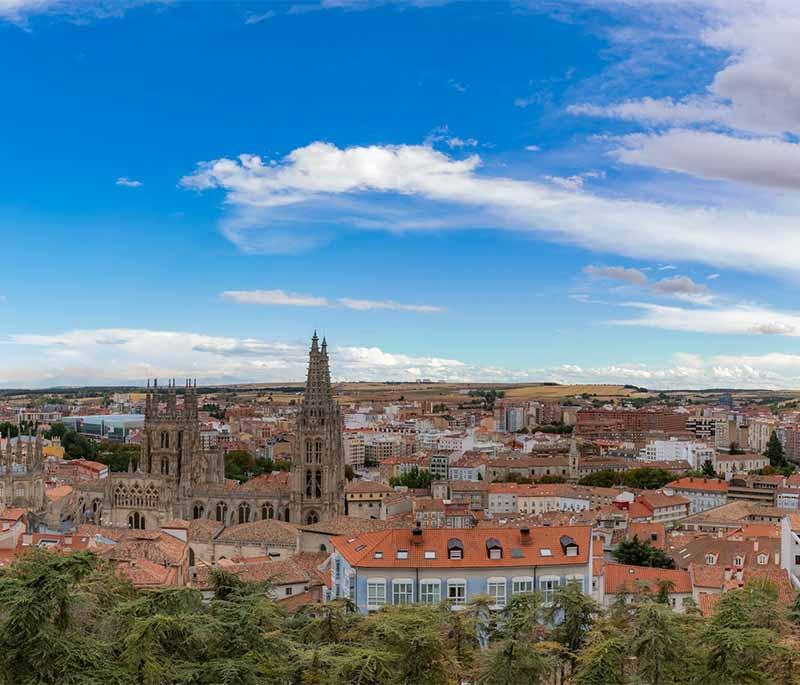 Paseo del Espolon (Burgos) - A scenic promenade along the Arlanzon River, known for statues, gardens, and historic buildings.