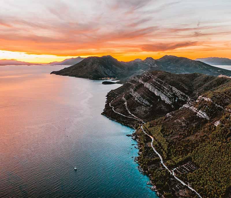 Pelješac Peninsula, famous for its vineyards, picturesque coastal towns, and the historic walls of Ston.