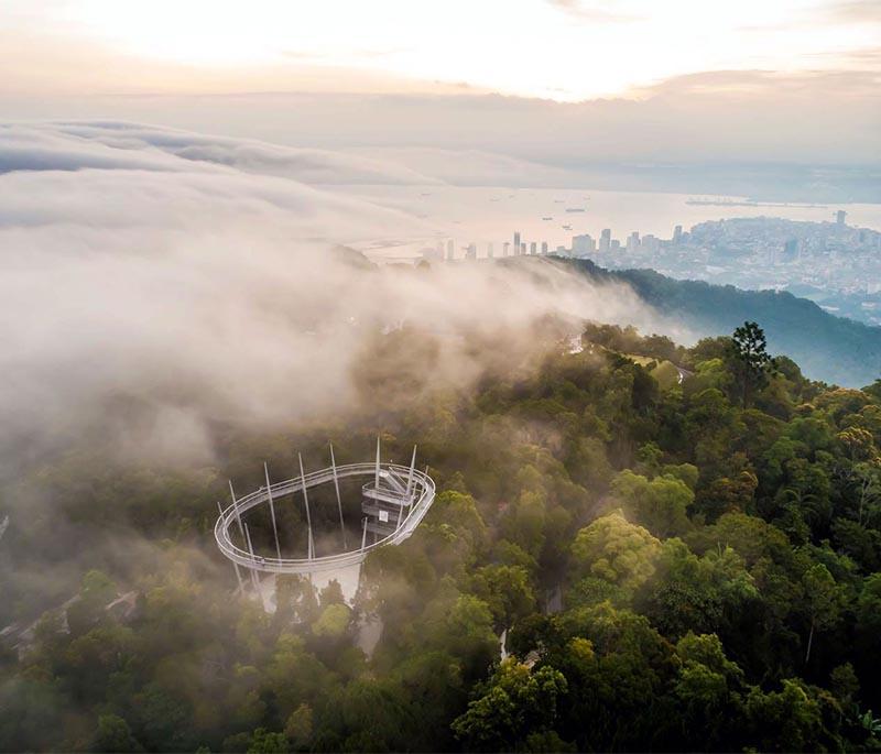 Penang Hill in Penang features a cooler climate with panoramic views of the island and lush surroundings.