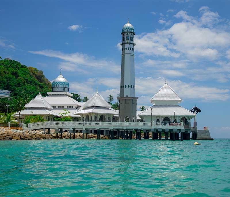 Perhentian Islands, Terengganu: Crystal-clear waters and vibrant marine life, perfect for snorkeling and diving enthusiasts.