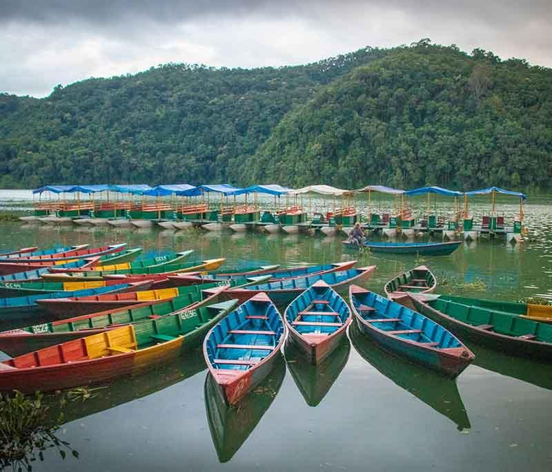 Phewa Lake, Pokhara - A scenic lake in Pokhara, known for boating and stunning reflections of the surrounding mountains.