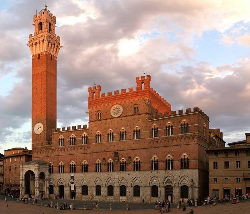 Piazza del Campo, Siena, a historic square known for its unique shell shape, medieval architecture, and the Palio horse race.