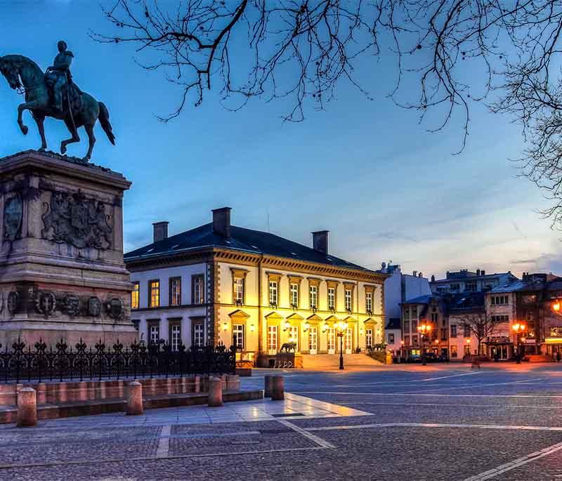 Place Guillaume II, a central square in Luxembourg City, known for its market, festivals, and the statue of William II.