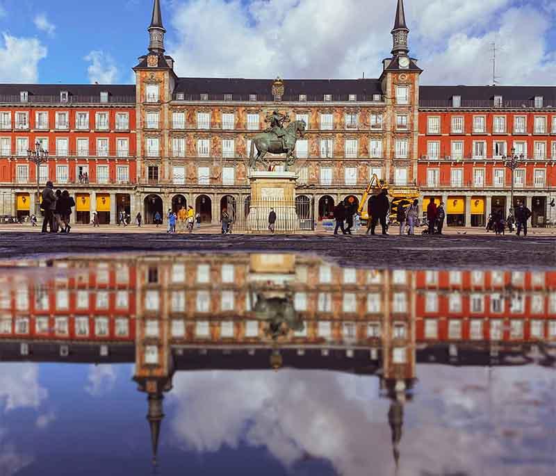 Plaza Mayor (Madrid) - A historic and picturesque square in the heart of Madrid, surrounded by Spanish architecture.