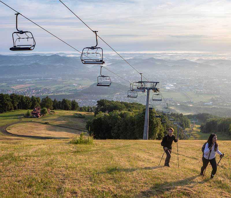 Pohorje Hills - A mountain range offering skiing in winter and hiking, biking, and nature activities in summer.