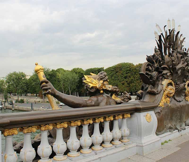 Pont Alexandre III, Paris, a stunning Beaux-Arts bridge spanning the Seine, known for its ornate decorations and sculptures.