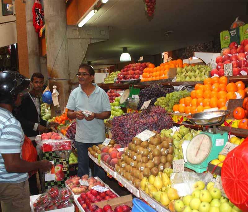 Port Louis Market - A vibrant local market offering a taste of local life, crafts, foods, and cultural experiences.