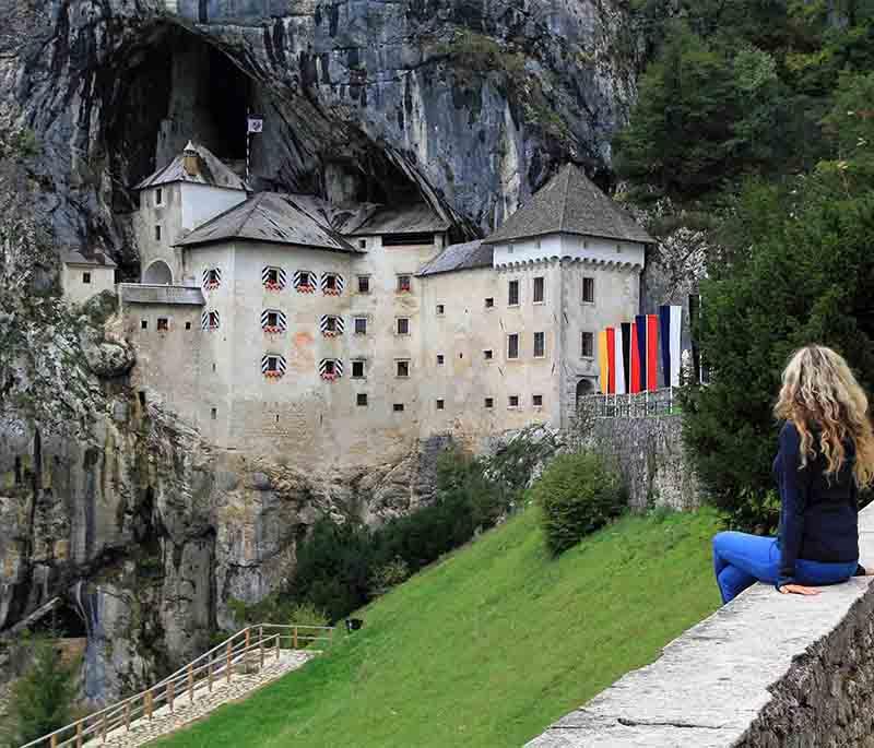 Predjama Castle - A dramatic cliffside castle built into the mouth of a cave, with a fascinating history.