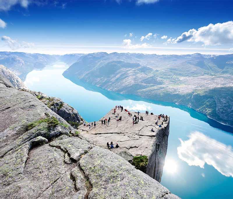 Preikestolen (Pulpit Rock) - A famous cliff with a flat top offering stunning views over the Lysefjord.