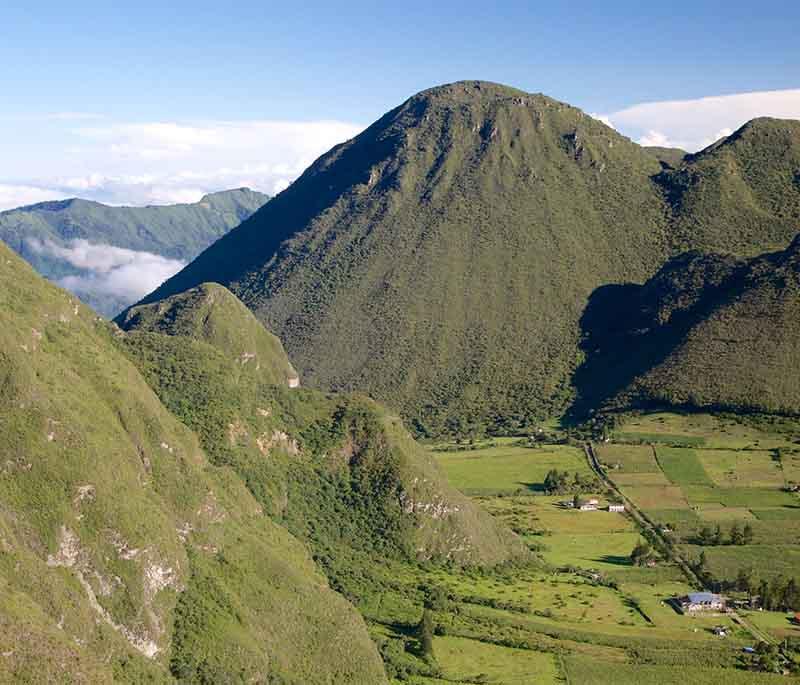Pululahua Geobotanical Reserve, one of the few inhabited volcanic craters, known for unique flora and hiking trails.