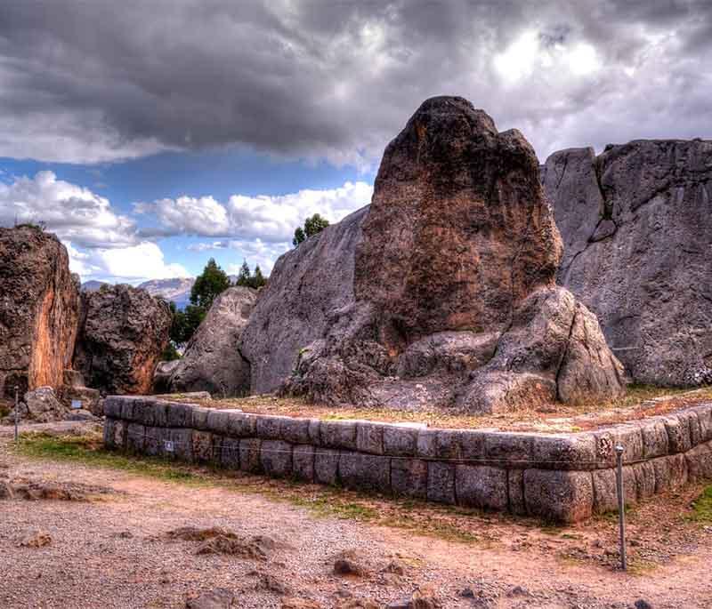 Qenqo - An Inca archaeological site with carved rock formations, underground chambers, and sacrificial altars.