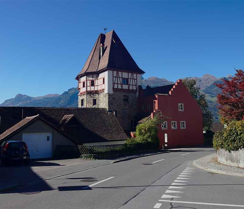 Red House (Rotes Haus), an iconic house in Vaduz known for its distinctive red façade and traditional architecture.