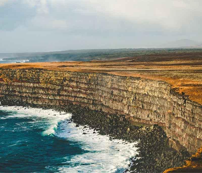 Reykjanes Peninsula, a geologically active region with geothermal fields, hot springs, and dramatic coastal landscapes.