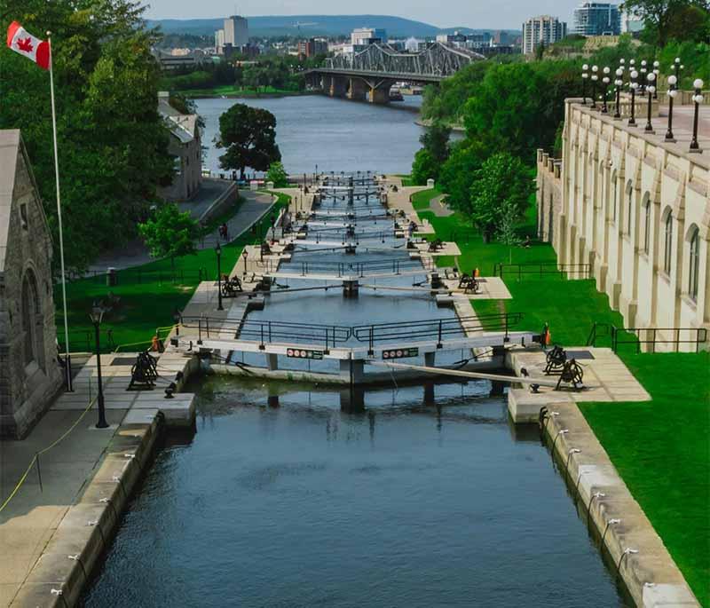 Rideau Canal in Ottawa, Ontario, is famous as a boating route in summer and the world’s largest skating rink in winter.