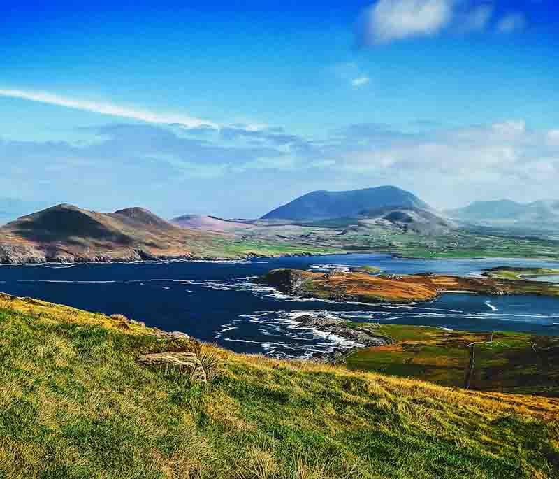 Ring of Kerry, a scenic drive around the Iveragh Peninsula, offering coastal views, charming villages, and historic sites.